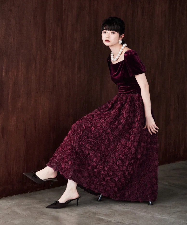 Bordeaux velvet midi dress with pearl necklace
