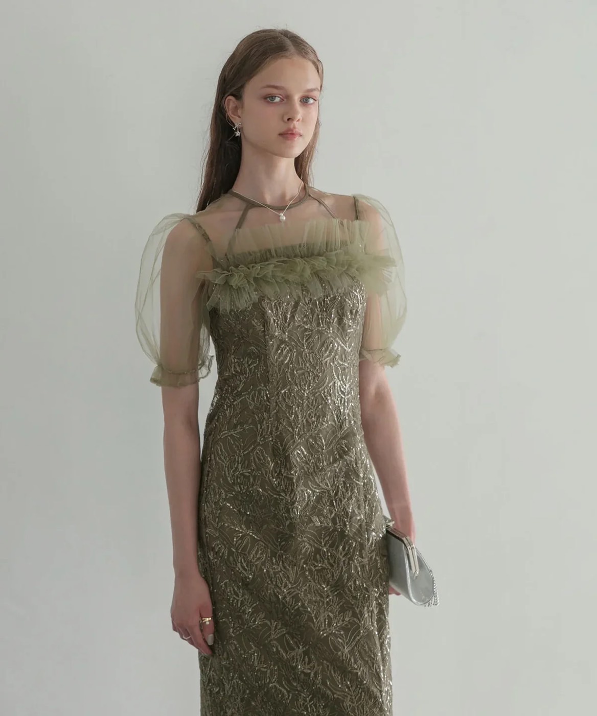 Sage green dress with sheer tulle sleeves