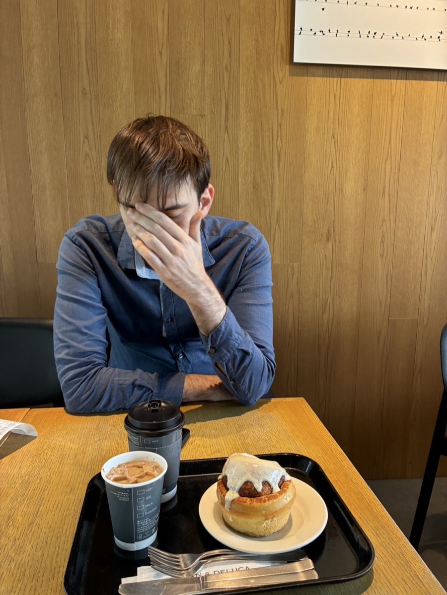 Coffee and a glazed cinnamon roll at Dean & Deluca